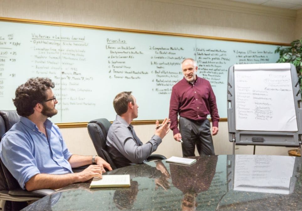 Team Meeting in Conference Room Tablet